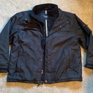 Men’s Haggar brand mid weight black jacket. Zipper & button closure size large